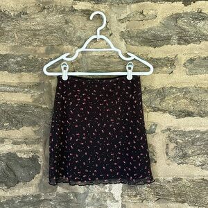 Black and pink floral mini skirt